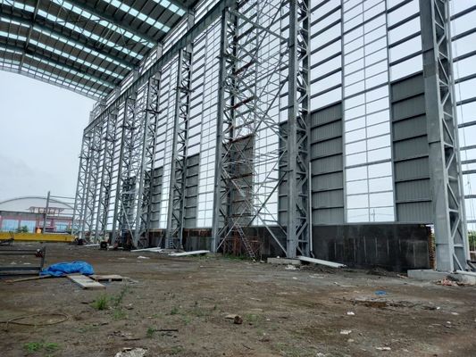 Q355 অথবা Q235 ফ্রেম গুদাম প্রিফ্যাব্রিকেটেড ধাতু কর্মশালা কারখানা